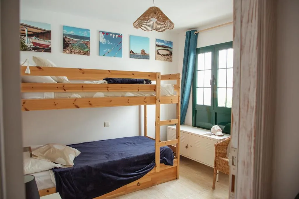 Letto a castello in camera condivisa mista — Vivilanza Surfhouse