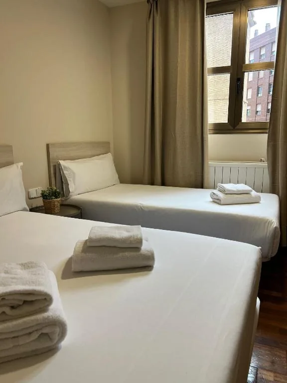 带加床的经济型双人间 — VTZ The Orus Factory Hotel - Parking Muy Económico