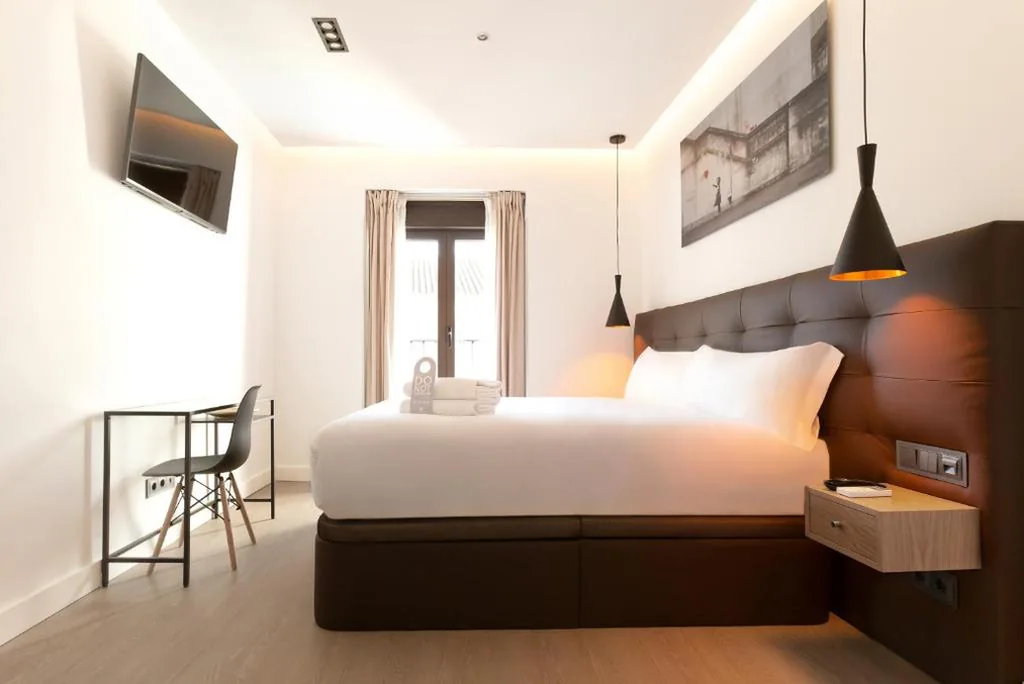Suite Familiar con balcón — Woohoo Rooms Boutique Sol