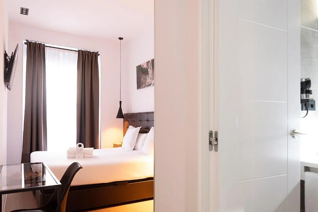 Suite Junior avec balcon — Woohoo Rooms Chueca