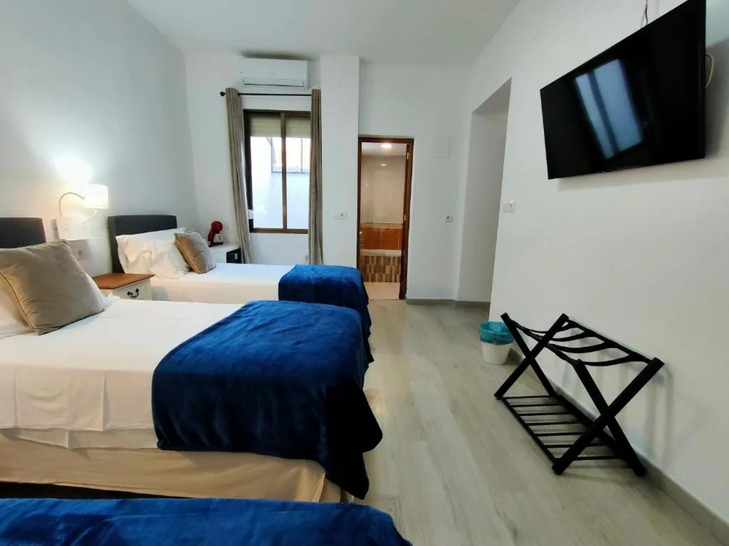 Tweepersoonskamer met extra bed - 2 bedden — Zaida Boutique Hotel